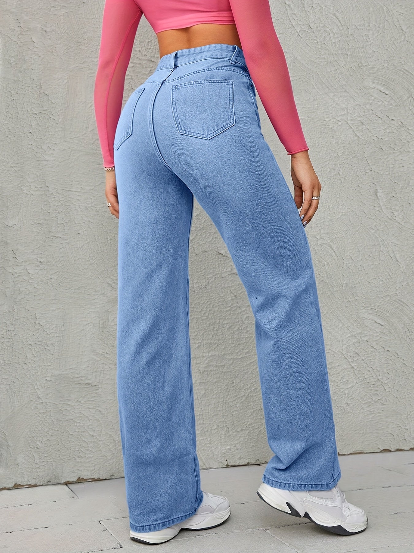 High waisted loose comfortable wide leg jeans blue light wash diagonal pockets medium stretch straight jeans