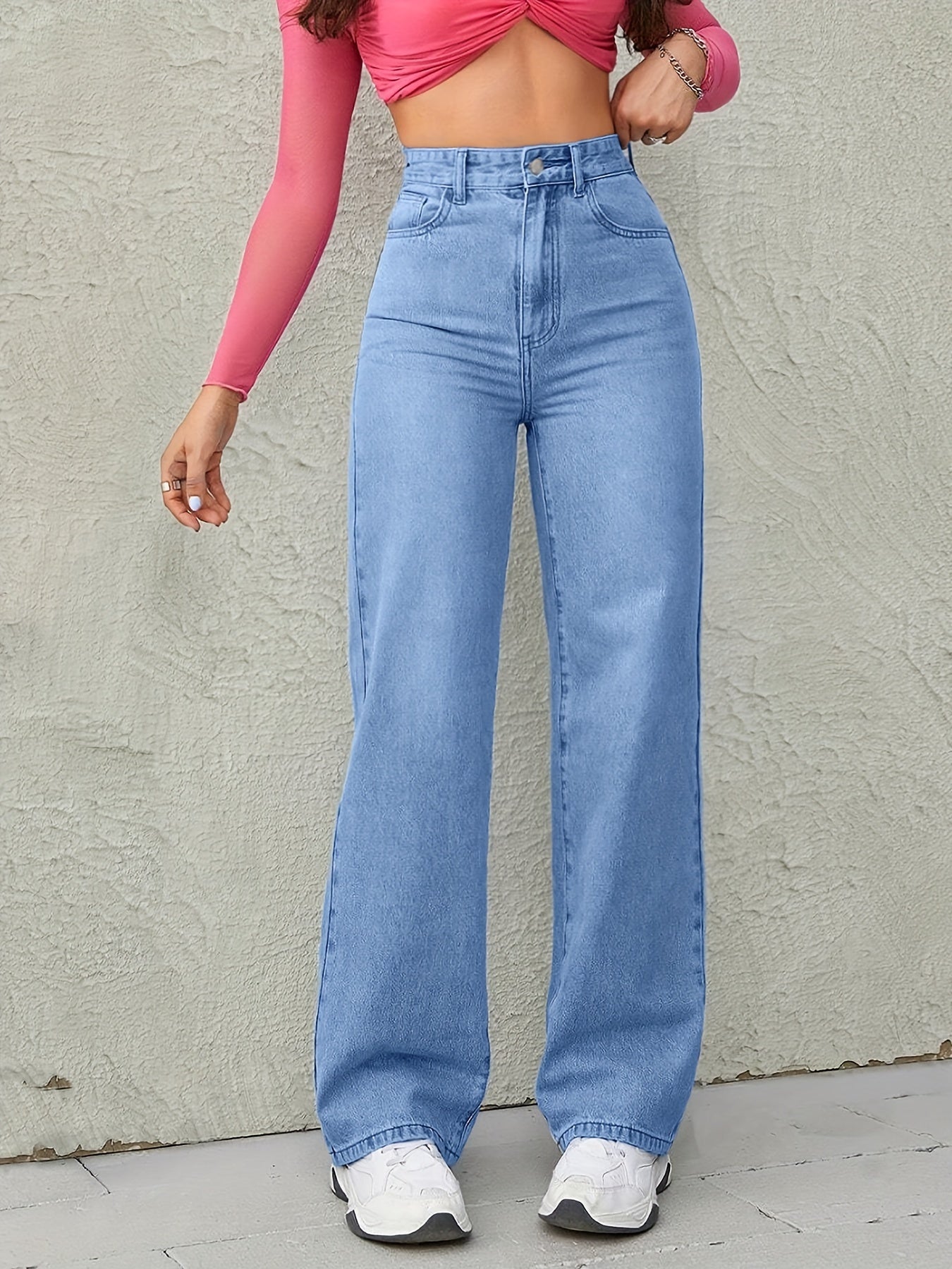 High waisted loose comfortable wide leg jeans blue light wash diagonal pockets medium stretch straight jeans