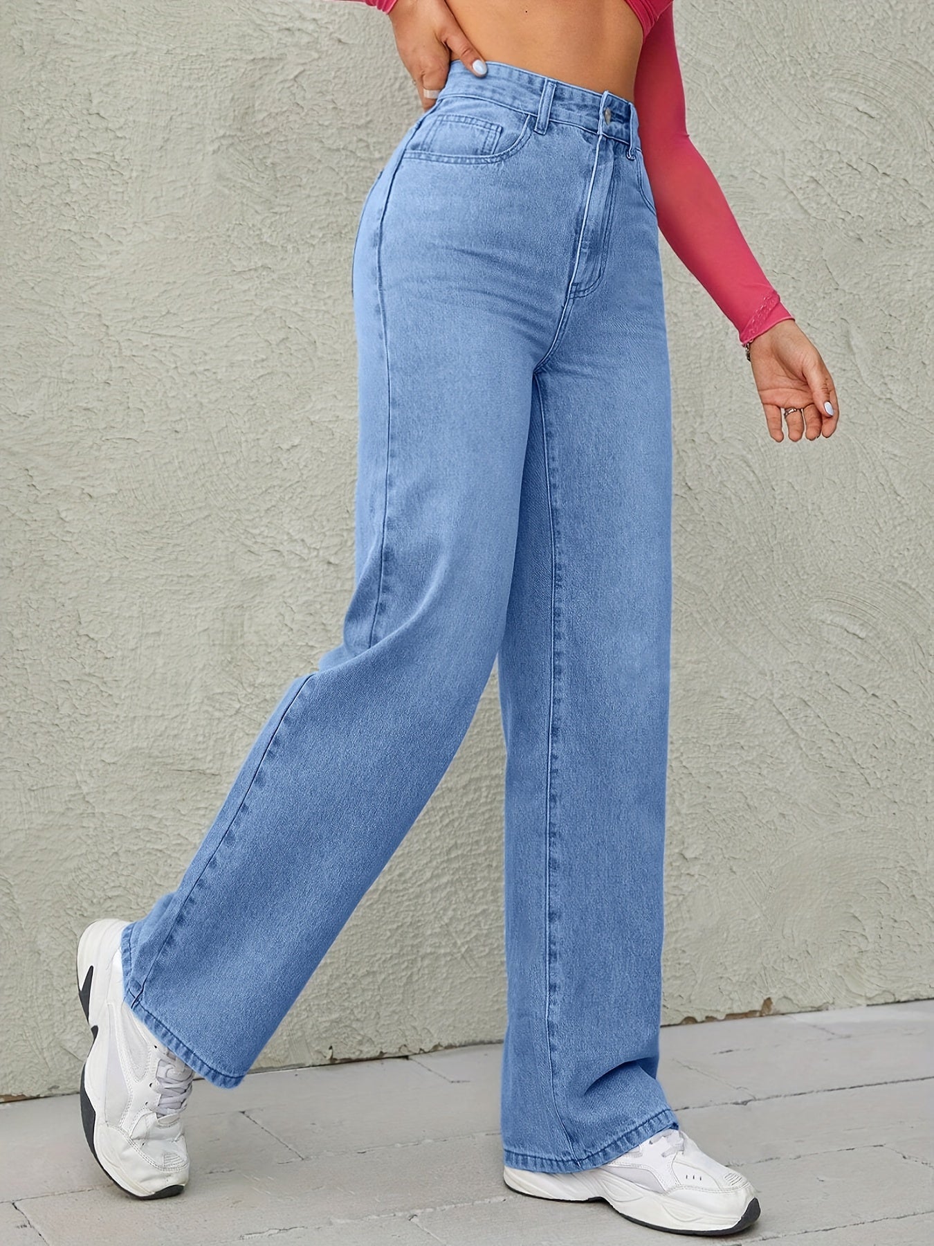 High waisted loose comfortable wide leg jeans blue light wash diagonal pockets medium stretch straight jeans